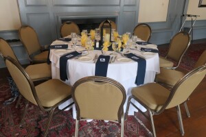 3 One Of The Table Settings Awaiting Participants In Front Of Colonial Fireplace